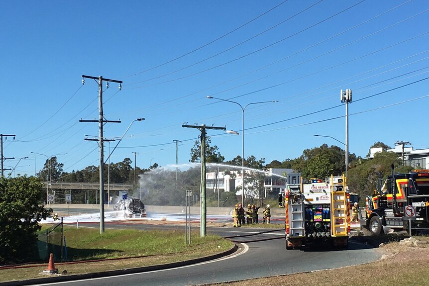 Firefighters extinguish truck fire near the M1 at Logan, south of Brisbane
