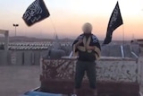 Still of video showing Australian man suspected of carrying out suicide bomb attack in Syria