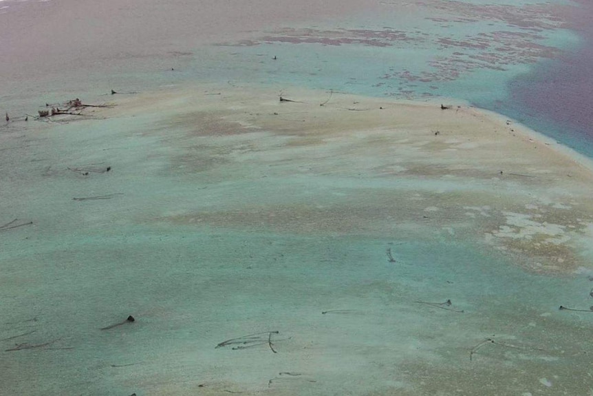 Eroded Pacific island due to rising sea levels