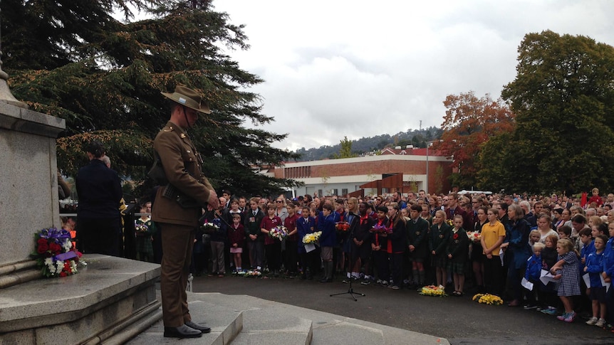 A soldier stands during the Launceston Anzac Day service