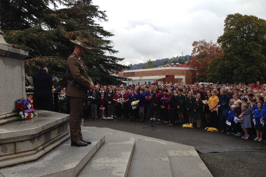 A soldier stands during the Launceston Anzac Day service