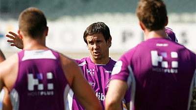 Matthew Johns speaks with Melbourne Storm players at a 2008 training session