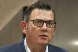 Daniel Andrews speaks at a press conference.