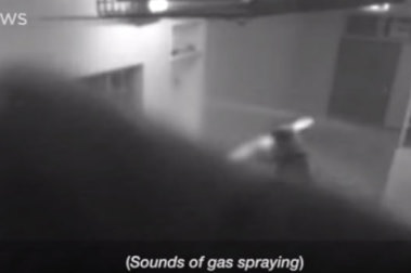 Grainy security-camera footage captioned "Sounds of gas spraying".