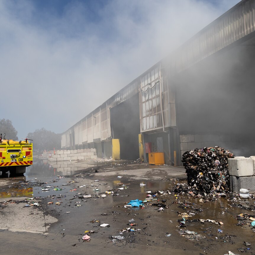 Smoke emits from the recycling centre.