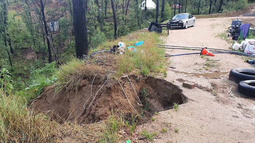 Rain has caused erosion where Storm Sparks was hoping to rebuild her home.