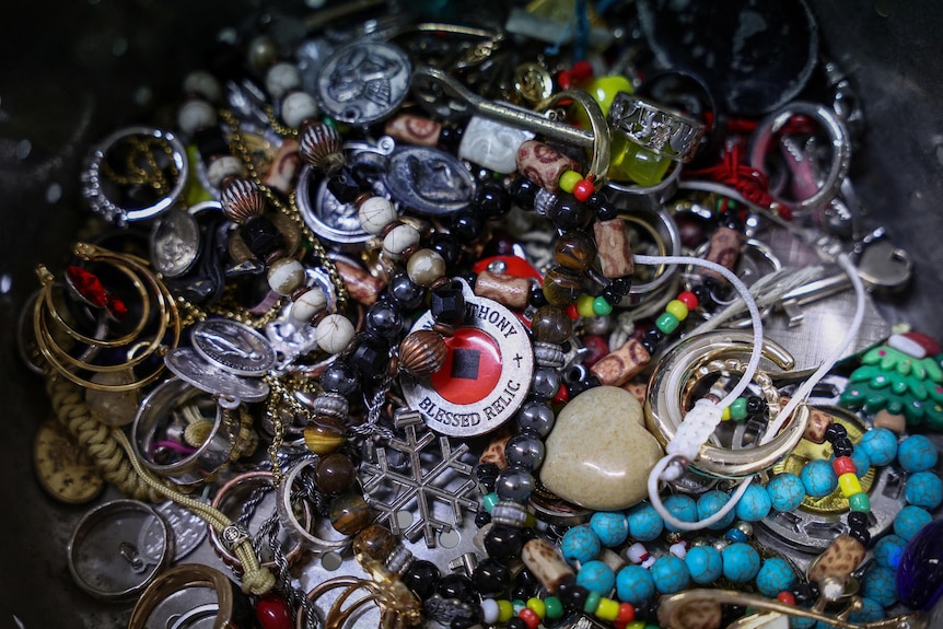 Other items found in the bottom of the Trevi Fountain in a pile lots of jewelry