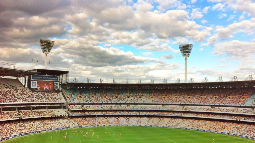 An interior view of the Melbourne Cricket Ground as an AFL game is being played