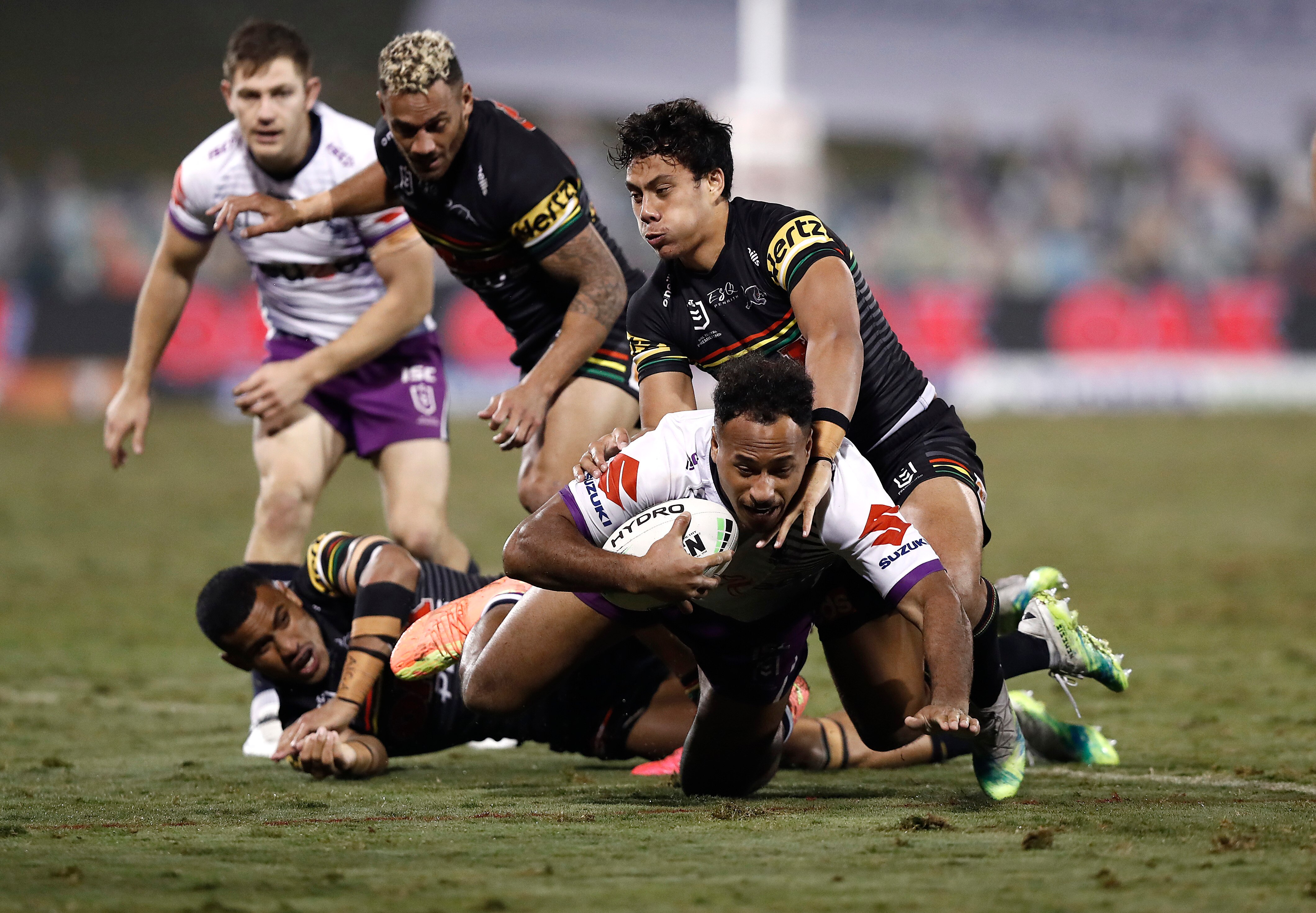 A man is tackled during a rugby league match