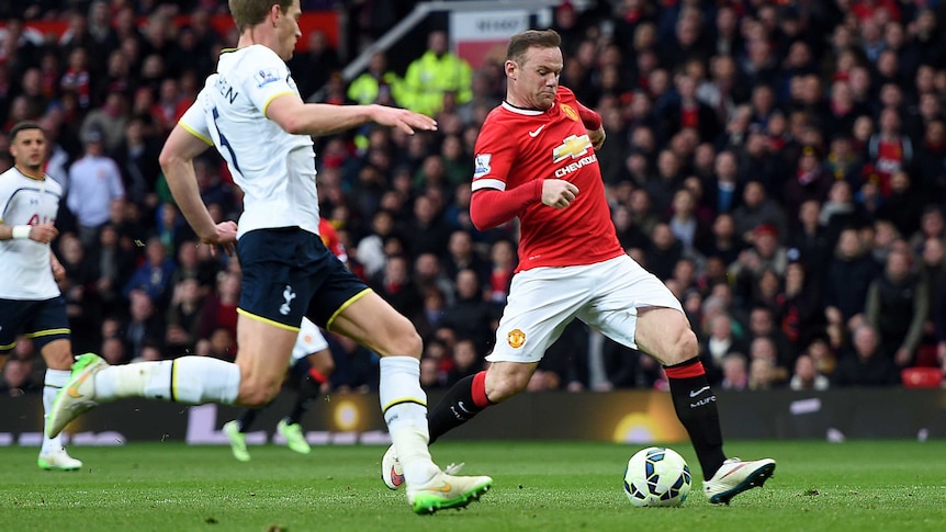 Wayne Rooney of Manchester United scores his team's third goal