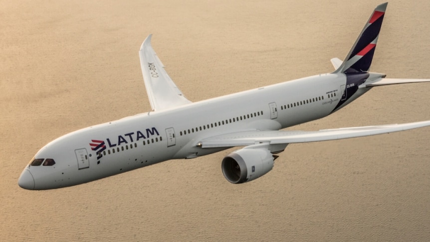 A plane with the LATAM Airlines logo flying