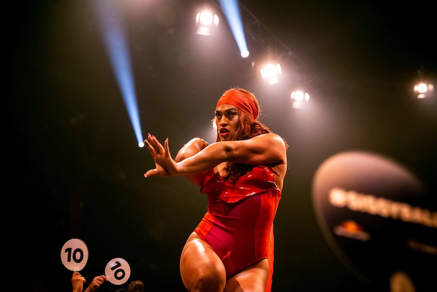 Vogue performer, Kilia Tipa, stretches out her hand on stage at Sissy Ball 2019.