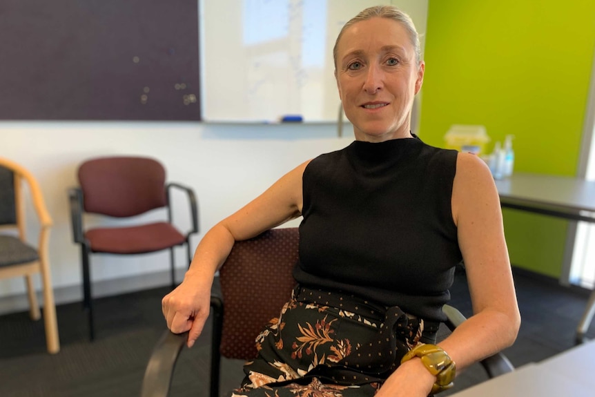 Professor Katie Flanagan sitting in her chair.