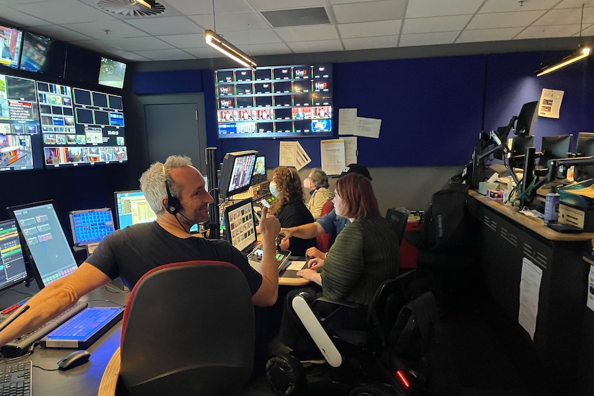 Elly Desmarchelier sitting with The Drum team in the control room