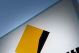 A Commonwealth Bank sign sits outside a branch