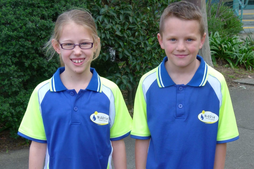 Niddrie PS kids model high visibility polo shirts