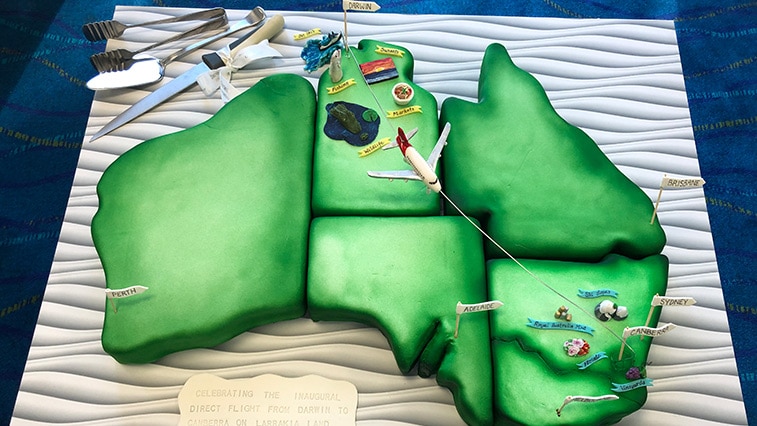 A cake made in the image of Australia, depicting a new air route between Darwin and Canberra