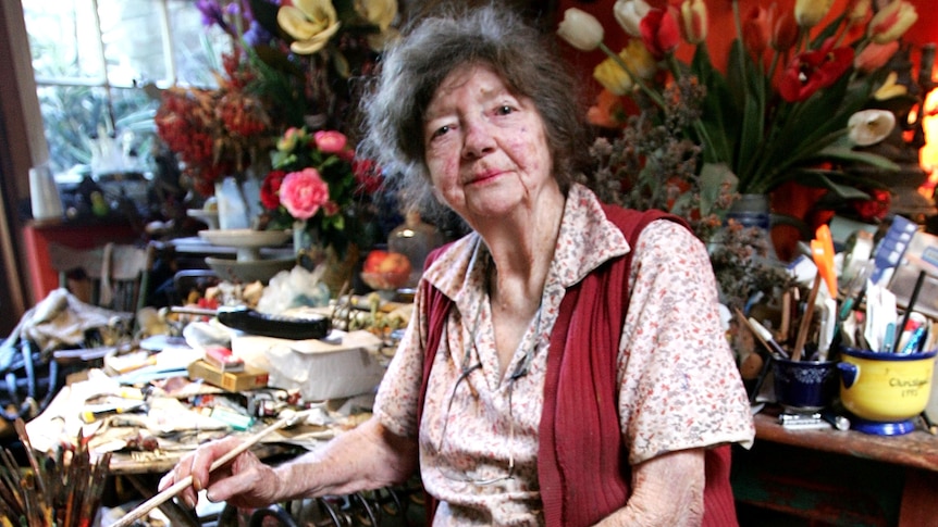 Painter Margaret Olley poses for a portrait session in her studio in Paddington.