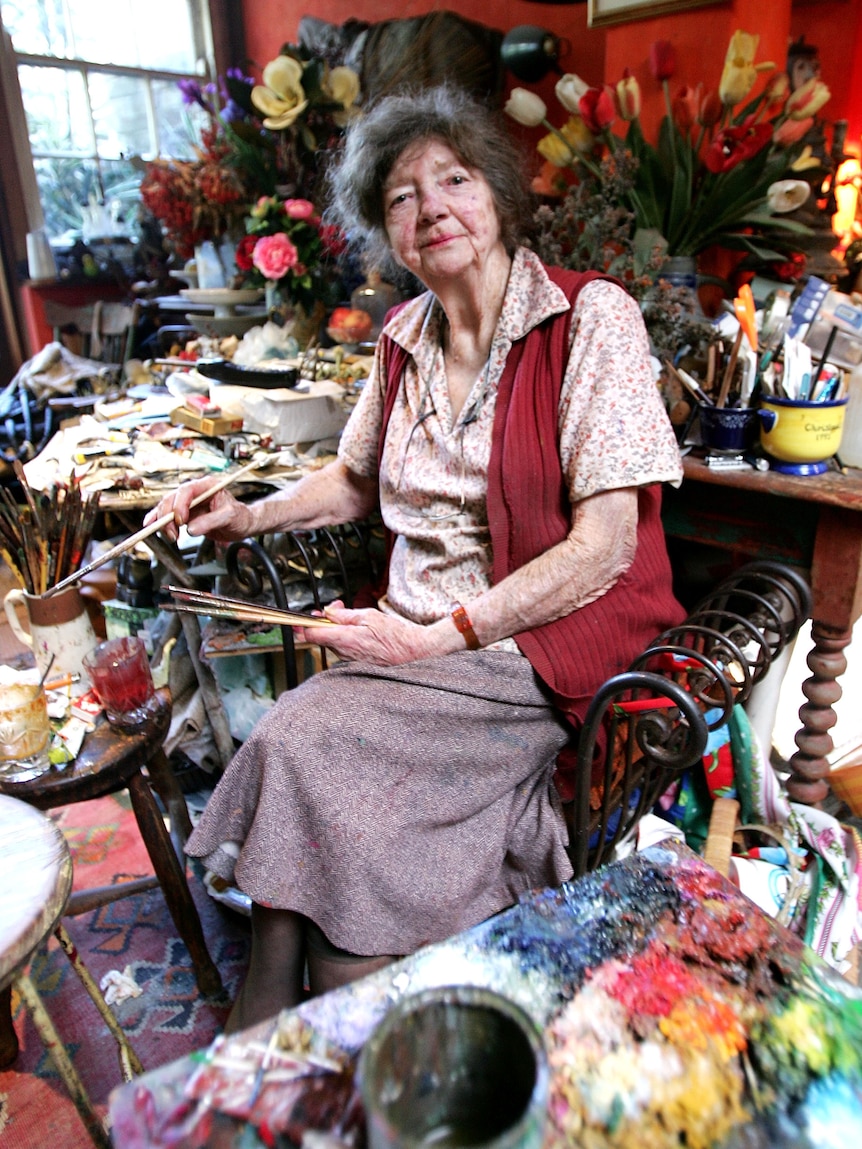 Painter Margaret Olley poses for a portrait session in her studio in Paddington.