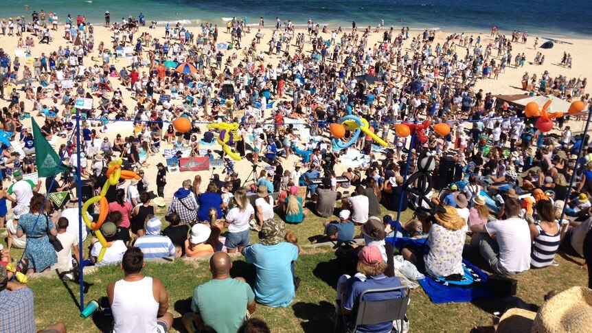Protesters gather on Cottesloe Beach