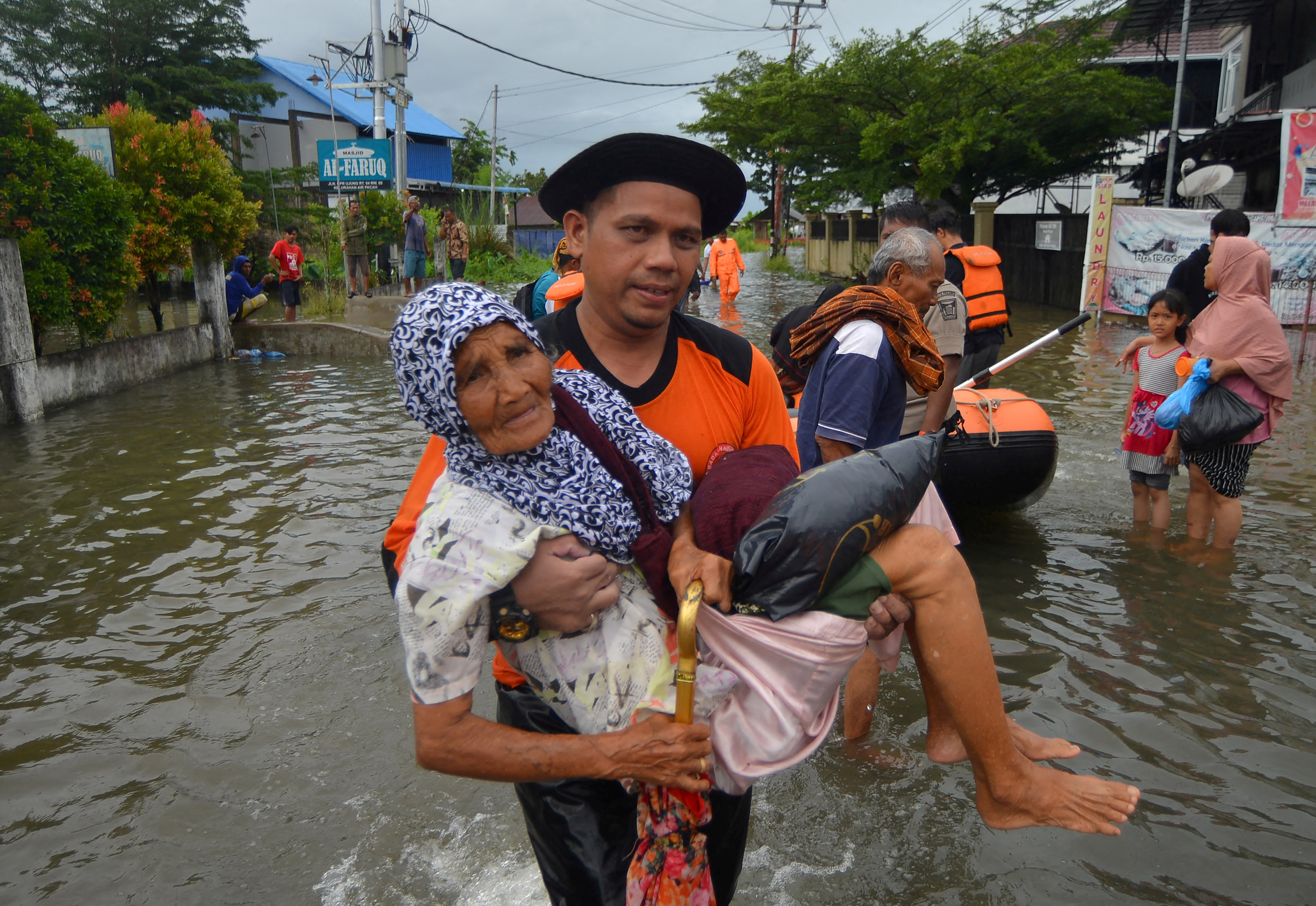 Rescuers Recover Bodies After Dozens Killed In Flash Flooding On ...