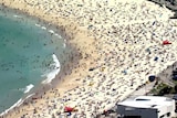 An aerial view of crowds at Bondi Beach.