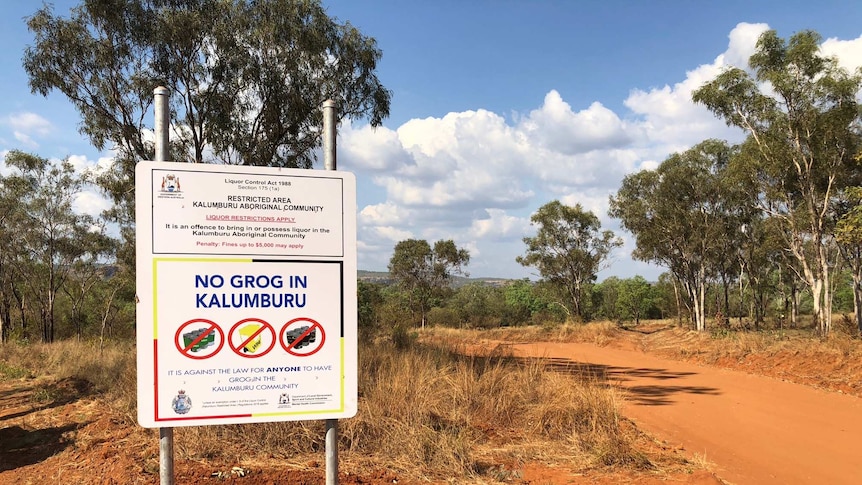 A photo of a sign in the desert outside Kalumburu which reads "No grog in Kalumburu".