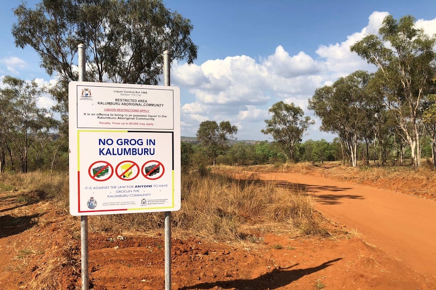 A photo of a sign in the desert outside Kalumburu which reads "No grog in Kalumburu".