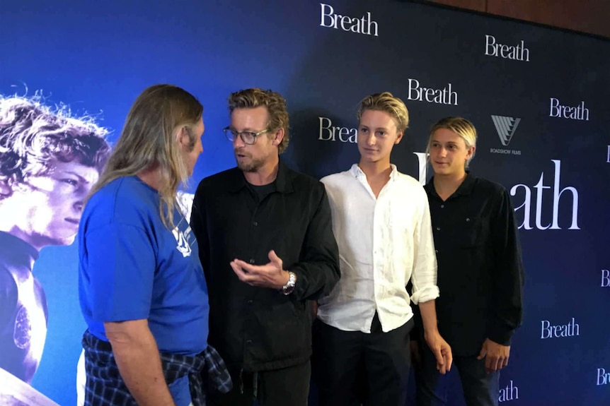 Simon Baker chats to author Tim Winton as two young actors look on