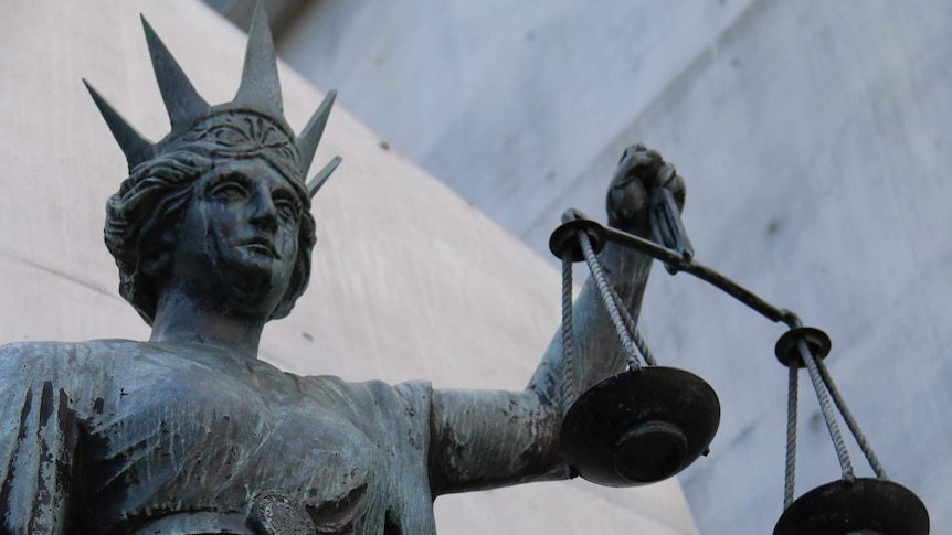 Close-up shot of Scales of Justice statue in Brisbane CBD on August 1, 2018.