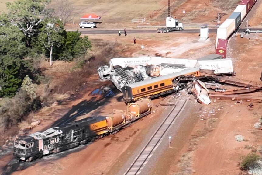 an aerial photo of a train crash