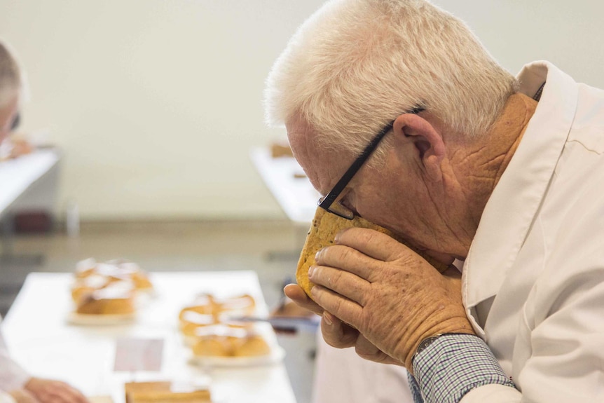 Judge smells a loaf of bread at the Royal Show