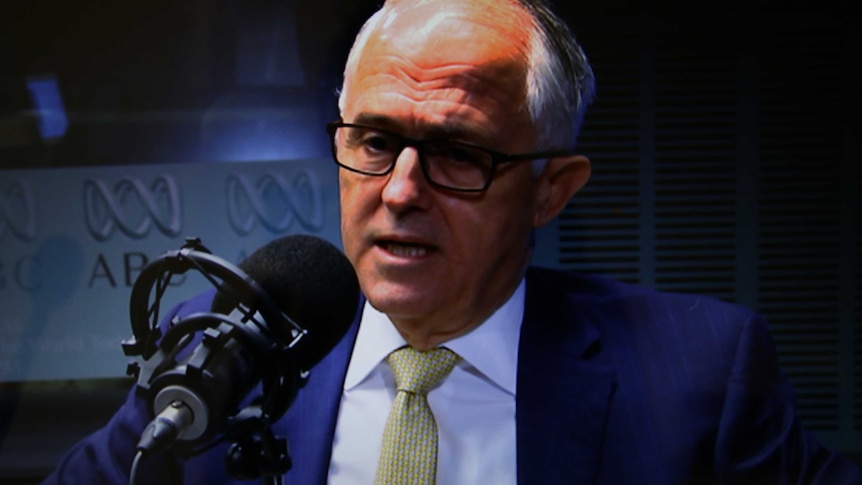 Prime Minister Malcolm Turnbull sits in front of an microphone at the ABC