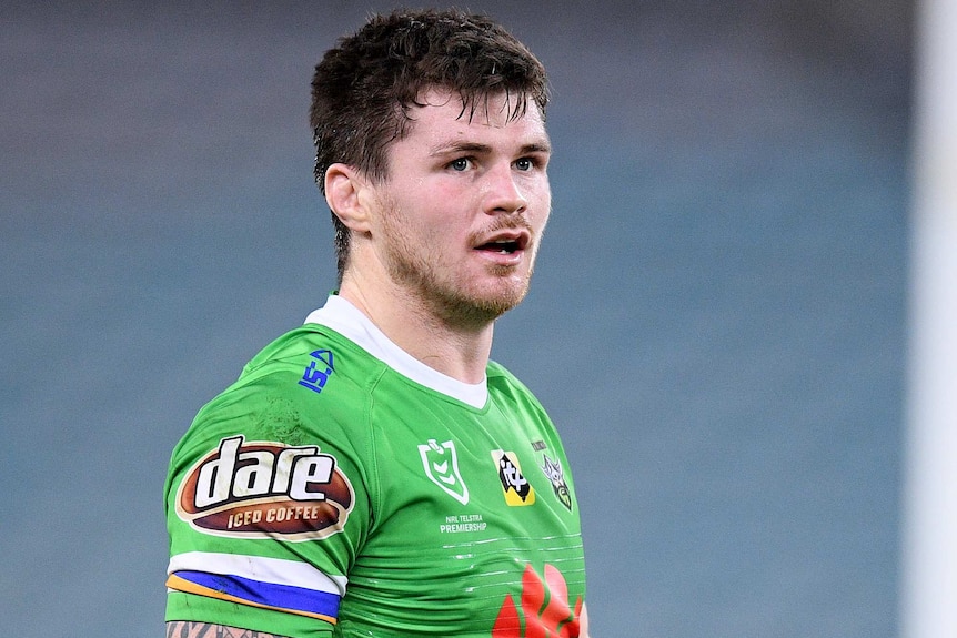 A Canberra Raiders NRL players stands alone during a match against Canterbury.