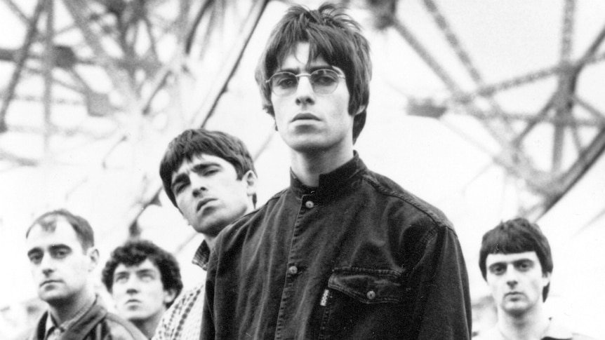 Early black and white photo of Manchester band Oasis