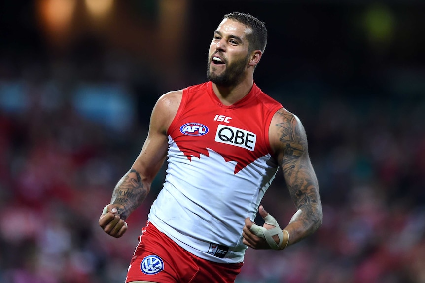 Lance Franklin of the Swans celebrates kicking a goal.