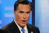 Former Massachusetts governor Mitt Romney speaks during the ABC News GOP Presidential debate on the campus of Drake University