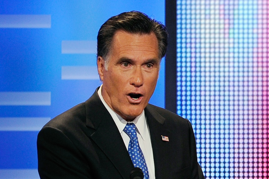 Former Massachusetts governor Mitt Romney speaks during the ABC News GOP Presidential debate on the campus of Drake University