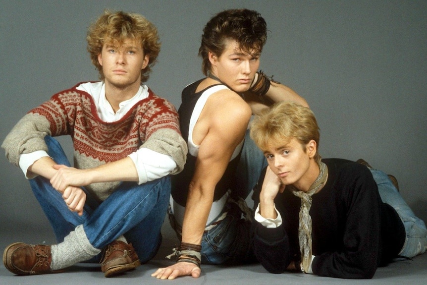 A-ha band members pose for a photoshoot in the 1980s.