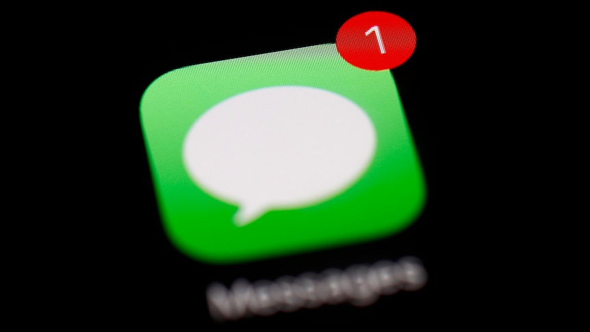 A close up of the Messages app displaying on an iPad screen, with a small notification badge in its top right