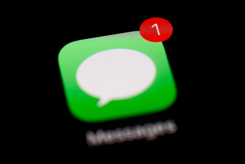 A close up of the Messages app displaying on an iPad screen, with a small notification badge in its top right