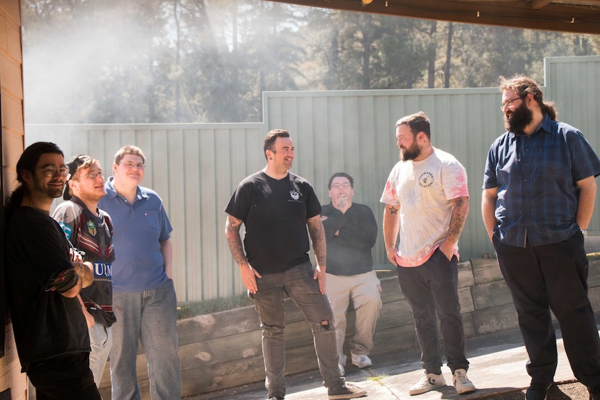 Nathan Boundy's friends talk in the backyard of Glen Hurry's Lithgow home