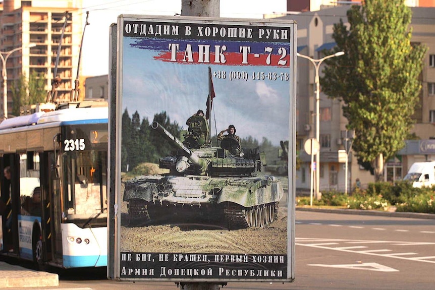 Propaganda posters calling for more volunteers to join the rebel army can be seen everywhere in Donetsk.