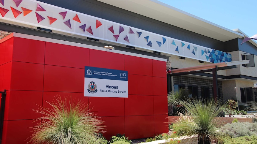The outside of the Vincent fire station is decorated with colourful shapes like paper planes.