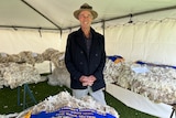 Donald McGregor stands among the fleece entries