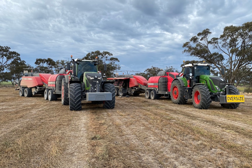 Tractors in a paddock.