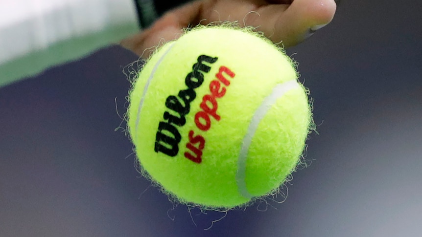 A tennis ball with Wilson US Open written on it