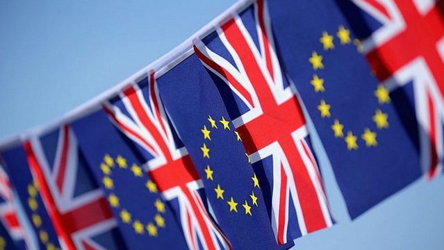 String of UK flags and EU flags