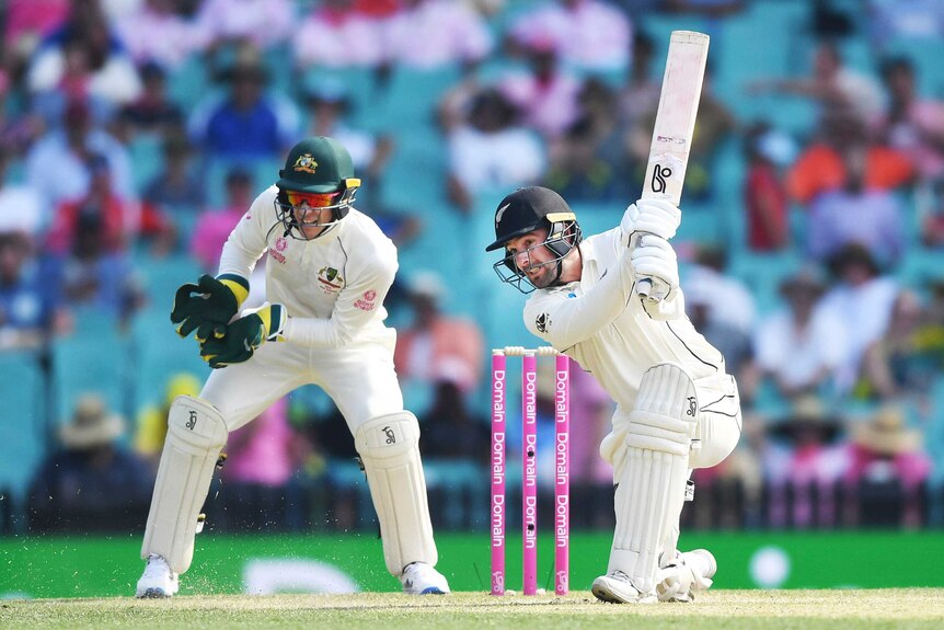 A New Zealand batsman gets on one knee to play a drive at the SCG.