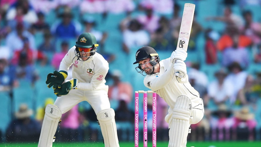 A New Zealand batsman gets on one knee to play a drive at the SCG.